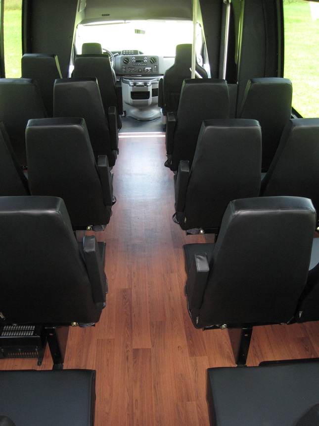 black 25 passenger executive bus, floor