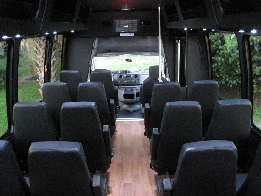 black 25 passenger executive bus, ir