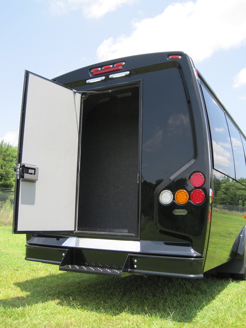 black 25 passenger executive bus, lug