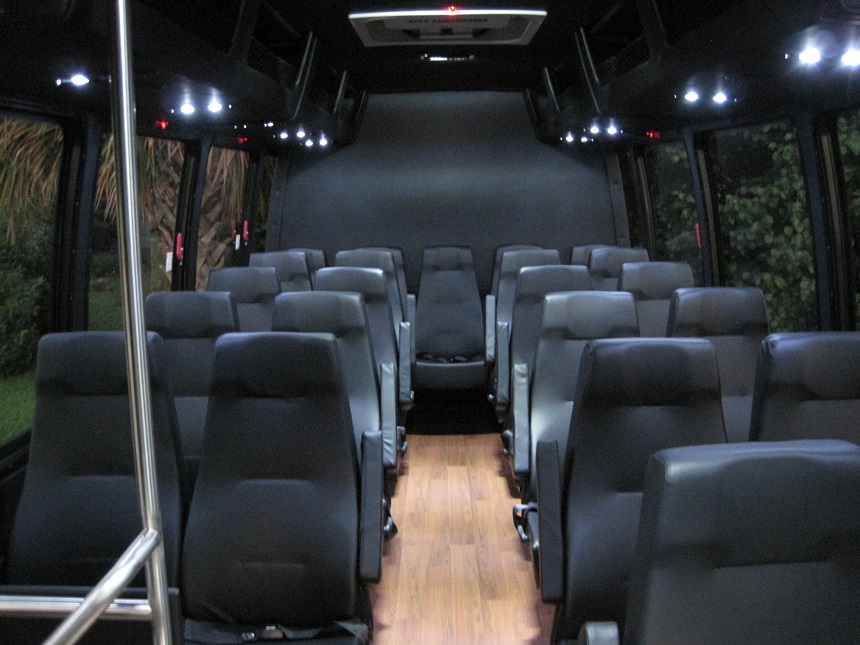 black 25 passenger executive bus, if